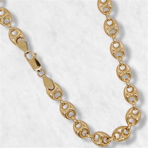 cadena de oro tejido gucci